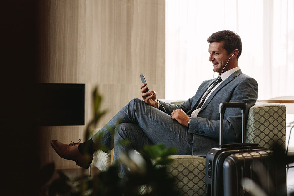 A person on the phone in an airport lounge