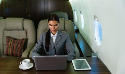 Businesswoman on a private jet