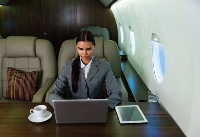 Businesswoman on a private jet